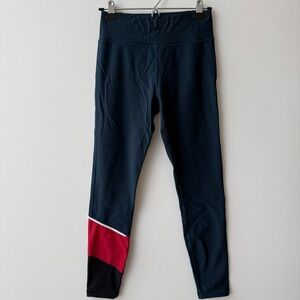 Sweaty Betty Fleece Lined Winter Running Leggings in Navy and Red.